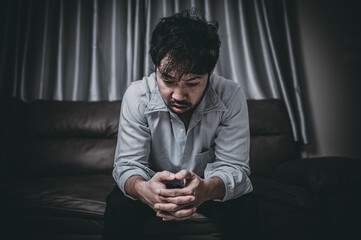 Asian handsome man stress from work overload,Tired male come back home after a lot of work from company,risk of depression