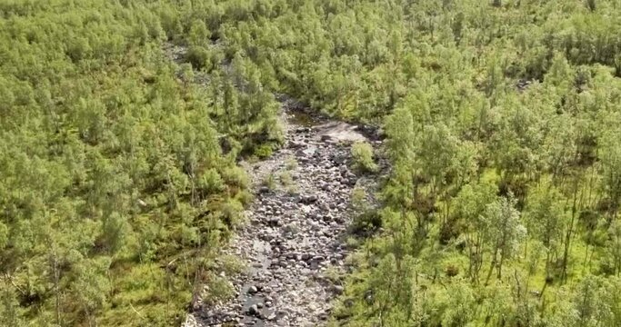 Aerial view of Galggojohka river on the E8 Nordlysveien road in summer when it&acute;s dried up, Storfjord, Troms og Finnmark, Norway. 
