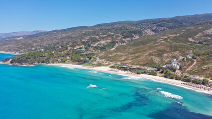 Aerial drone photo of famous wavy beach of Mesakti ideal for wind surfing in island of Ikaria, Aegean, Greece