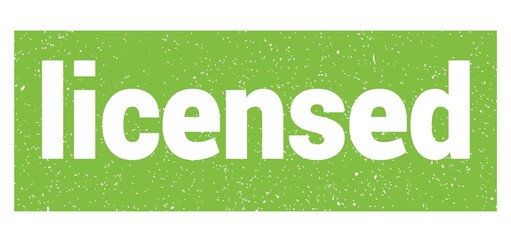 licensed text written on green stamp sign.