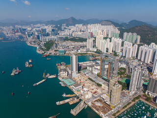 Obraz na płótnie Canvas Aerial view of Hong Kong concrete factory and the residential district