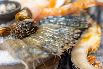 Bowl of seafood for hotpot in restaurant