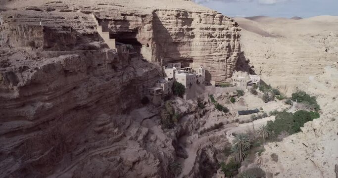 St. George Orthodox Monastery and Wadi Qelt in Judean desert. Monastery of St. George of Choziba, Israel. The sixth-century cliff-hanging complex
