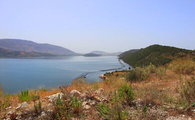 Landscape with Lake Butrin and mussel farm in Albania