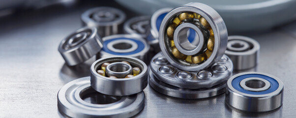 different bearings on a metal background. Part of mechanism.