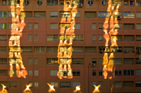 Reflection of another building on apartment building in Lisbon, Portugal.