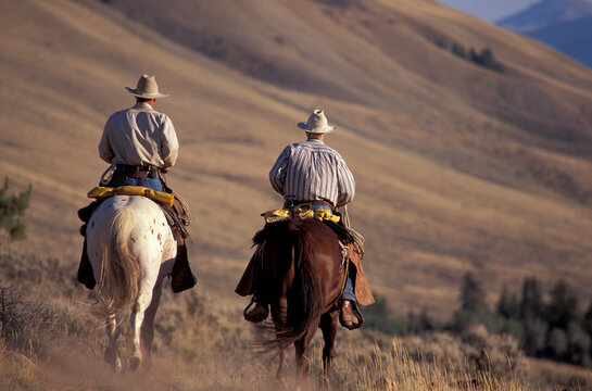 model released, Sam Schaefer & Renny Burke on Horseback, EA Ranch Dubois, Cowboys, Wyoming, USA