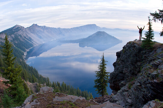 Young man hiking at Crater Lake National Park, Oregon