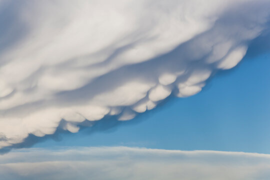 Detail of lumpy mammatus clouds on the underside of a storm cloud in Never Summer Wilderness, Colorado.