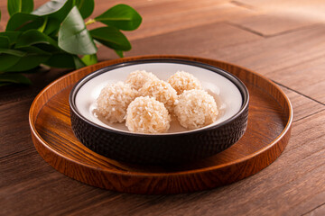 Snowflake Glutinous Rice Steamed Meatballs served dish isolated on wooden table top view of Hong Kong food