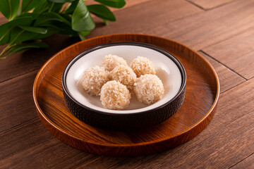 Snowflake Glutinous Rice Steamed Meatballs served dish isolated on wooden table top view of Hong...