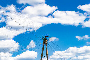Power electric pole with line wire on colored background close up