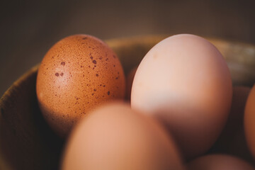 Close-up of brown eggs in bowl