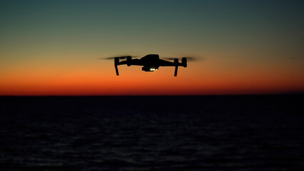 Fototapeta na wymiar Drone in the air, spectacular sunrise over the sea
