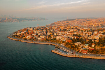 Aerial Drone View of Istanbul Uskudar Seaside. Bosphorus Bridge in Istanbul at sunset.