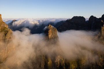 Great morning on the Pico do Areeiro in Madeira with epic fog around the rocks.