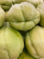 chayote displayed in a grocery shop