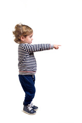 side veiw of baby boy pointing on white background