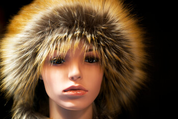 Mannequin wearing a fur hat