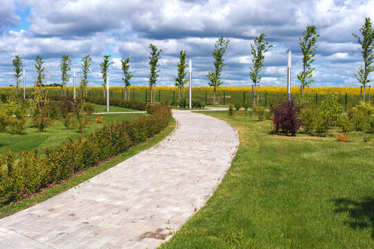 View of the pathway in the park in Gusev town in the Kaliningrad region, Russia