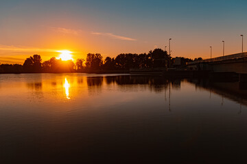 Beautiful sunset with reflections near Plattling, Isar, Bavaria, Germany
