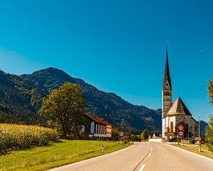 Fototapeta na wymiar Beautiful alpine summer view with the famous church Saint Leonhard near Kundl, Tyrol, Austria