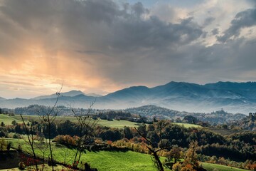 autumn landscapes of the Piedmontese Langhe with its colors and hills near Alba, in the province of...