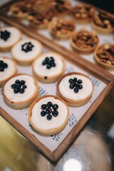 many different delicious desserts on the table in the cafe