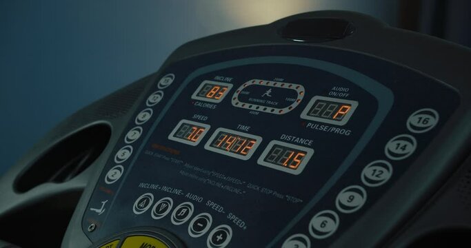Closeup of treadmill control panel with electronic screen for sport exercise