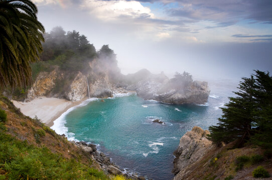 Fog rolls in at the classic Big Sur overlook in Julia Pfeiffer Burns State Park in California.