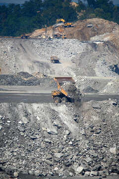 Massive dump truck deposits overburden into a valley fill at the Kayford mountaintop removal coal mine site