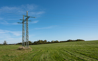 High voltage transmission, wiring over a green field