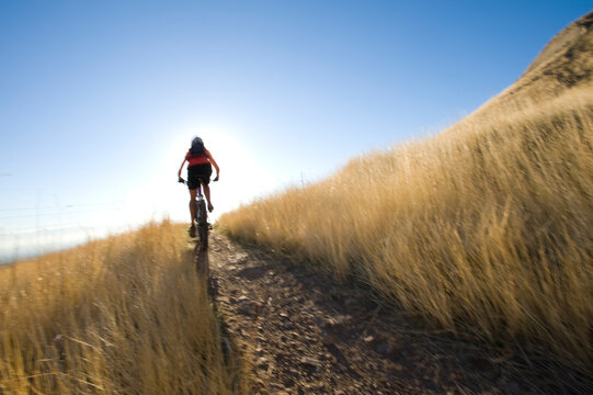 Woman mountan biking, Salt Lake City, Utah.