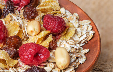 muesli nuts raisins fresh berries and flakes