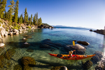 Kayaker in Secret Harbor, Tahoe, CA
