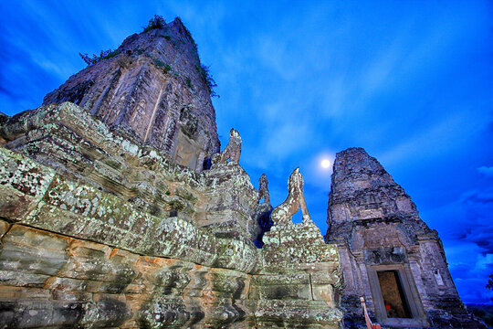 View of Pre Rup temple and rain falling on back