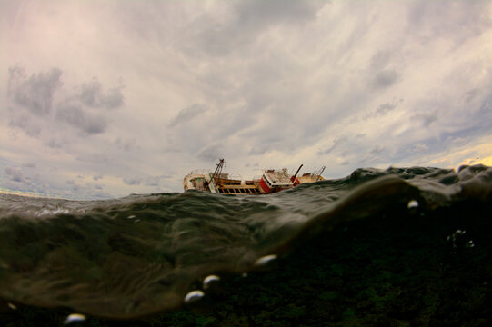 Shipwrecks aground on Middleton Reef, is a coral reef in the Tasman sea.