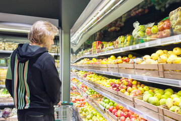 Man buying fruits at the market