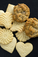 Macro Image of Delicious Shortbread and Raisins Cookies on Dark Background