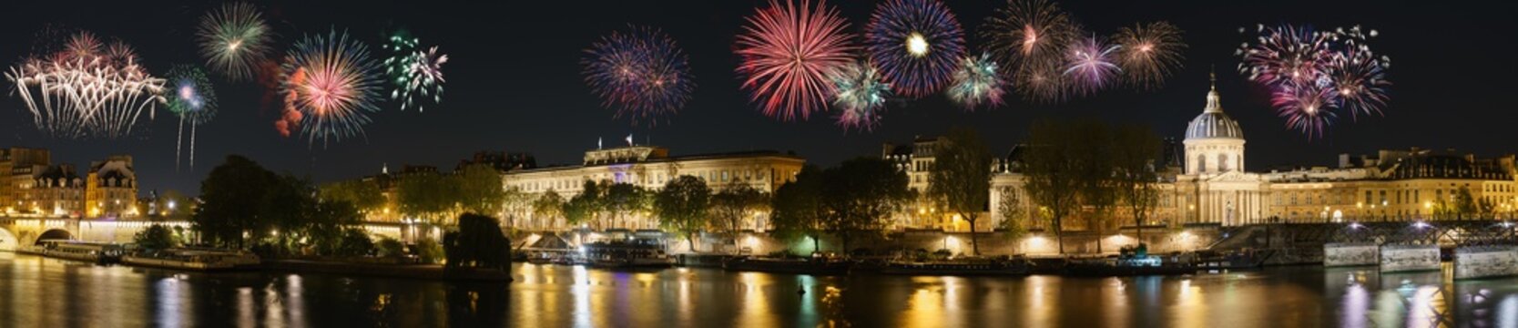 Paris riverside panorama with New Year Fireworks