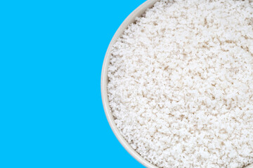 Flower of salt on blue background.