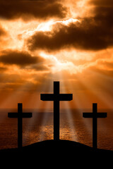Silhouette of Jesus Christ crucifixion on cross on Good Friday Easter over heaven sunset sunrise...