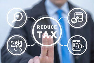 Businessman using virtual touchscreen presses inscription: REDUCE TAX. Tax payment reduction,...