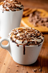Hot chocolate. Irish coffee or spiked hot chocolate. Classic holiday drink made with hot coffee, Irish cream flavored liquor, mocha, Kahula, chocolate and topped with whipped cream and a cherry.