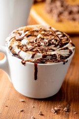 Hot chocolate. Irish coffee or spiked hot chocolate. Classic holiday drink made with hot coffee, Irish cream flavored liquor, mocha, Kahula, chocolate and topped with whipped cream and a cherry.