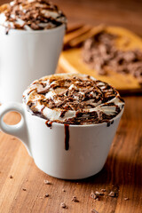 Hot chocolate. Irish coffee or spiked hot chocolate. Classic holiday drink made with hot coffee, Irish cream flavored liquor, mocha, Kahula, chocolate and topped with whipped cream and a cherry.