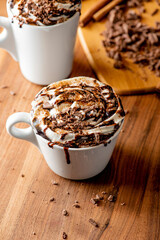 Hot chocolate. Irish coffee or spiked hot chocolate. Classic holiday drink made with hot coffee, Irish cream flavored liquor, mocha, Kahula, chocolate and topped with whipped cream and a cherry.