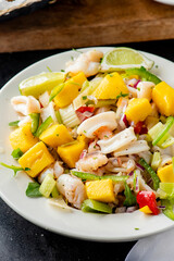 Lobster ceviche. Ceviche made with fresh diced seafood, shrimp, scallops, sea bass and lobster marinated in lime juice, cilantro, jalapeños, salsa salt and pepper. Served with fried tortilla chips.