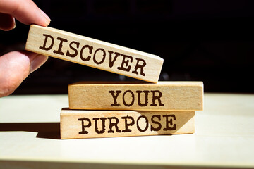 Wooden blocks with words 'Discover your purpose'.