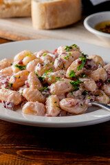 Gnocchi. Pasta sautéed with truffles garlic, onions, olive oil and fresh herbs and spices. Classic American steakhouse or French bistro appetizer or side dish.